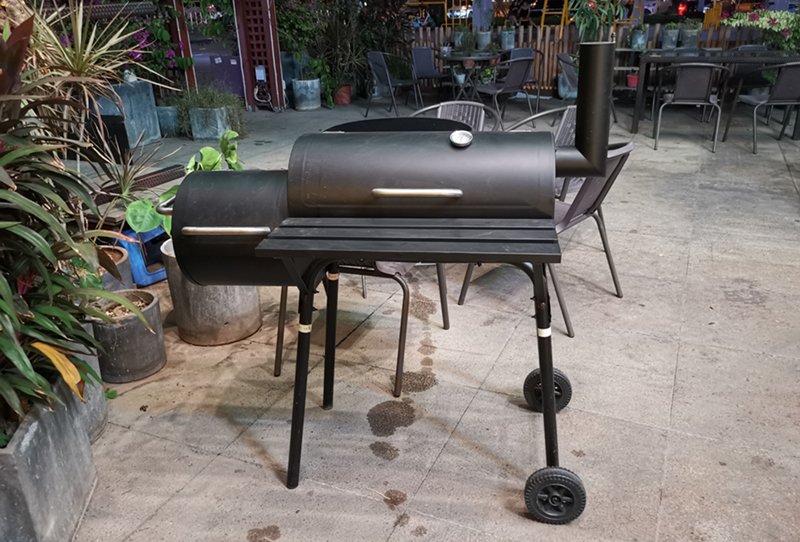 Black Charcoal Grill wiht side firebox